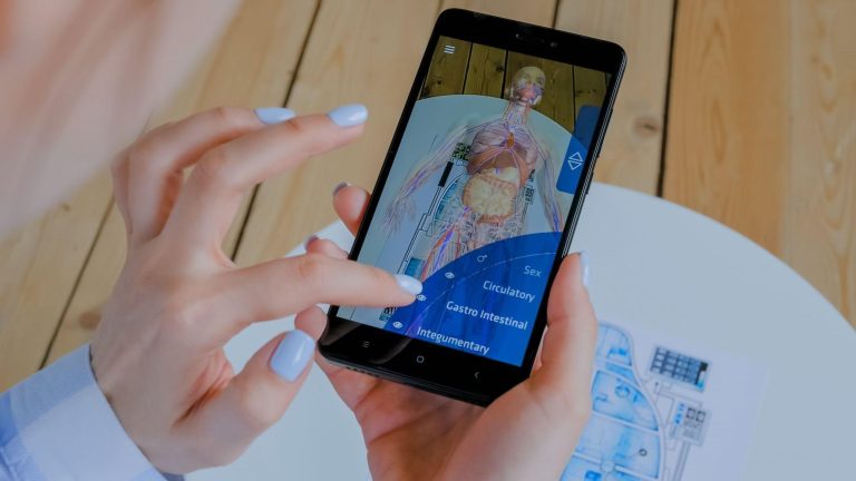 Medical professional using augmented reality medical software.